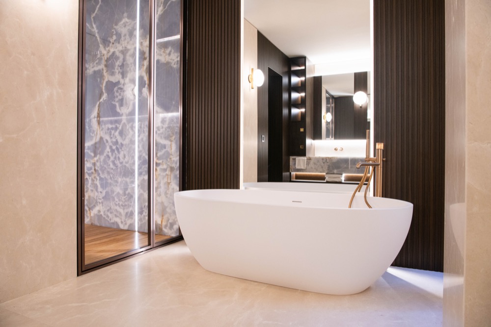 Principal bathroom with a freestanding bath and a walk-in shower